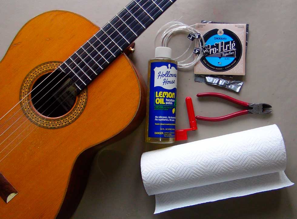 Changing Strings On a Nylon String Guitar and Oiling the Fingerboard