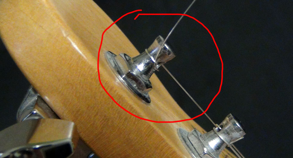 Trapping the string against the tuning peg